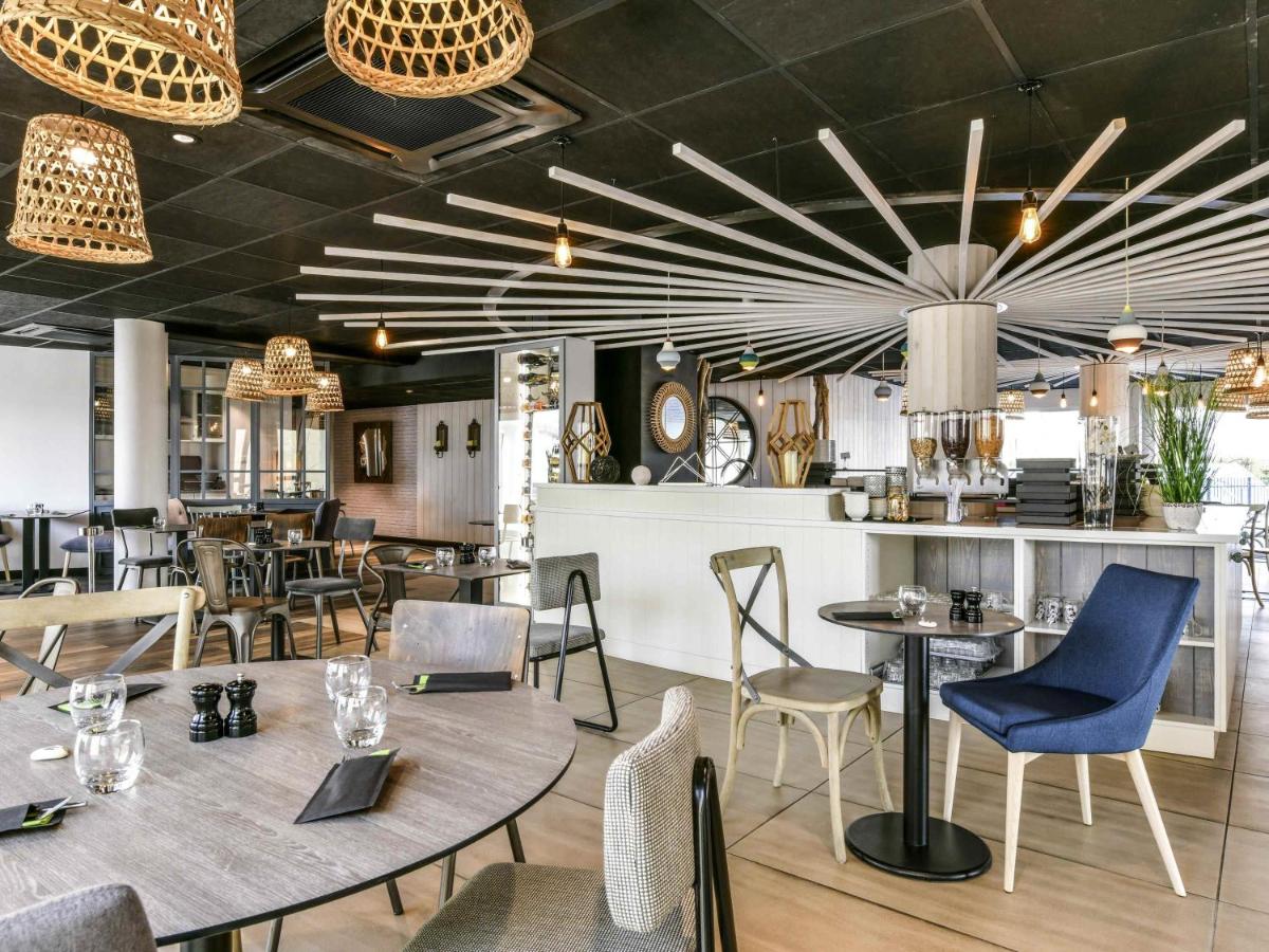 Restaurant ou autre lieu de restauration dans l'établissement ibis styles La Rochelle Thalasso Chatelaillon