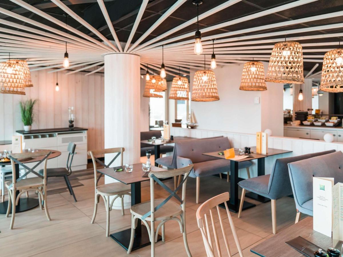 Restaurant ou autre lieu de restauration dans l'établissement ibis styles La Rochelle Thalasso Chatelaillon
