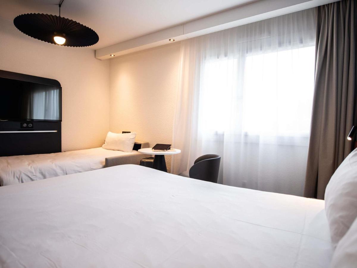 Un ou plusieurs lits dans un hébergement de l'établissement ibis La Baule Pornichet Plage
