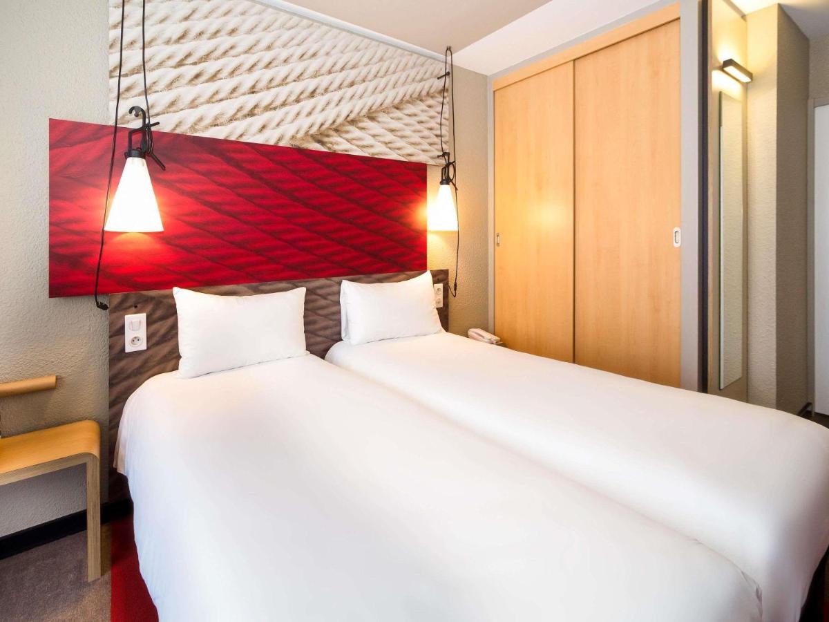 Un ou plusieurs lits dans un hébergement de l'établissement ibis La Baule Pornichet Plage
