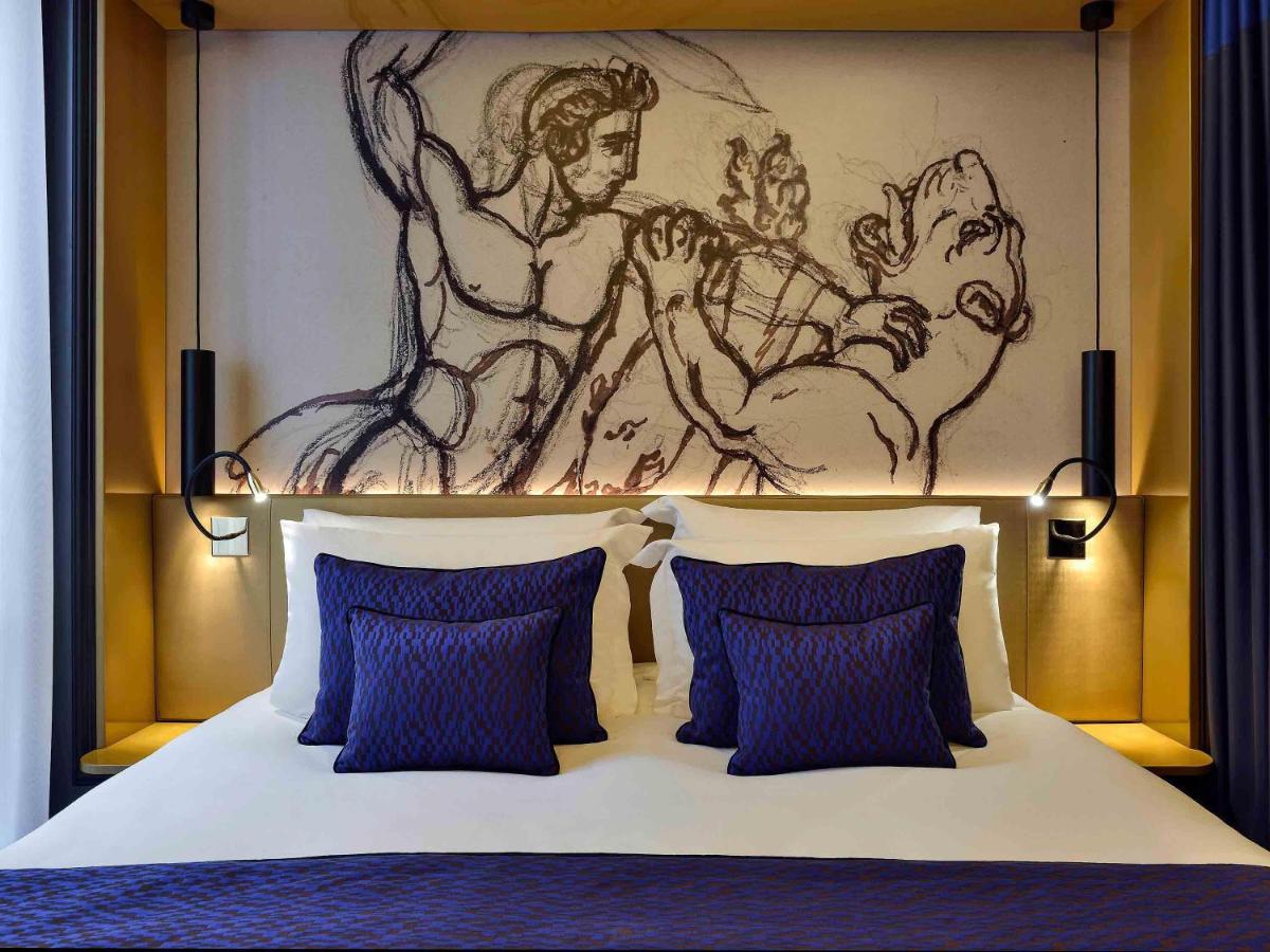 Un ou plusieurs lits dans un hébergement de l'établissement Grand Hôtel La Cloche Dijon - MGallery Collection