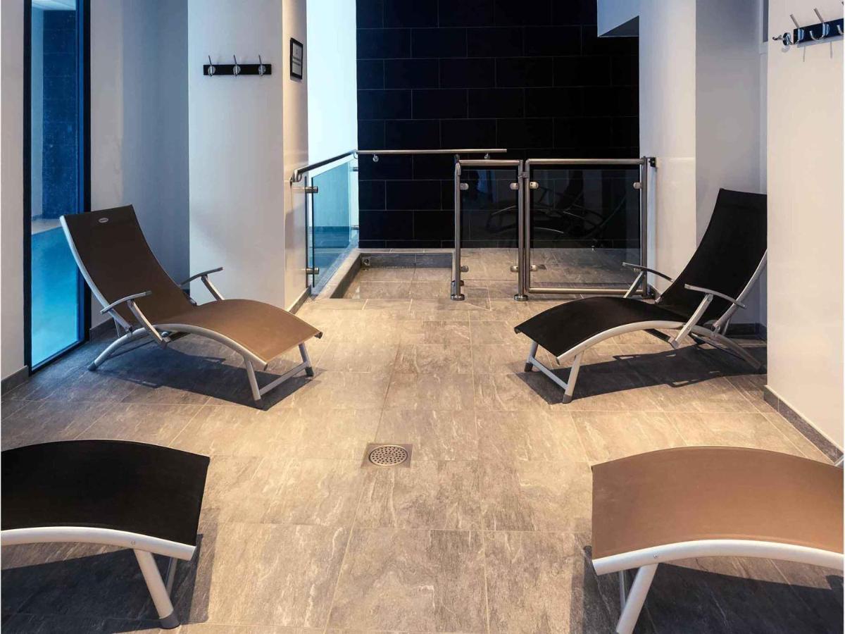 Coin salon dans l'établissement Mercure Saint Nectaire - Spa & Bien-Être