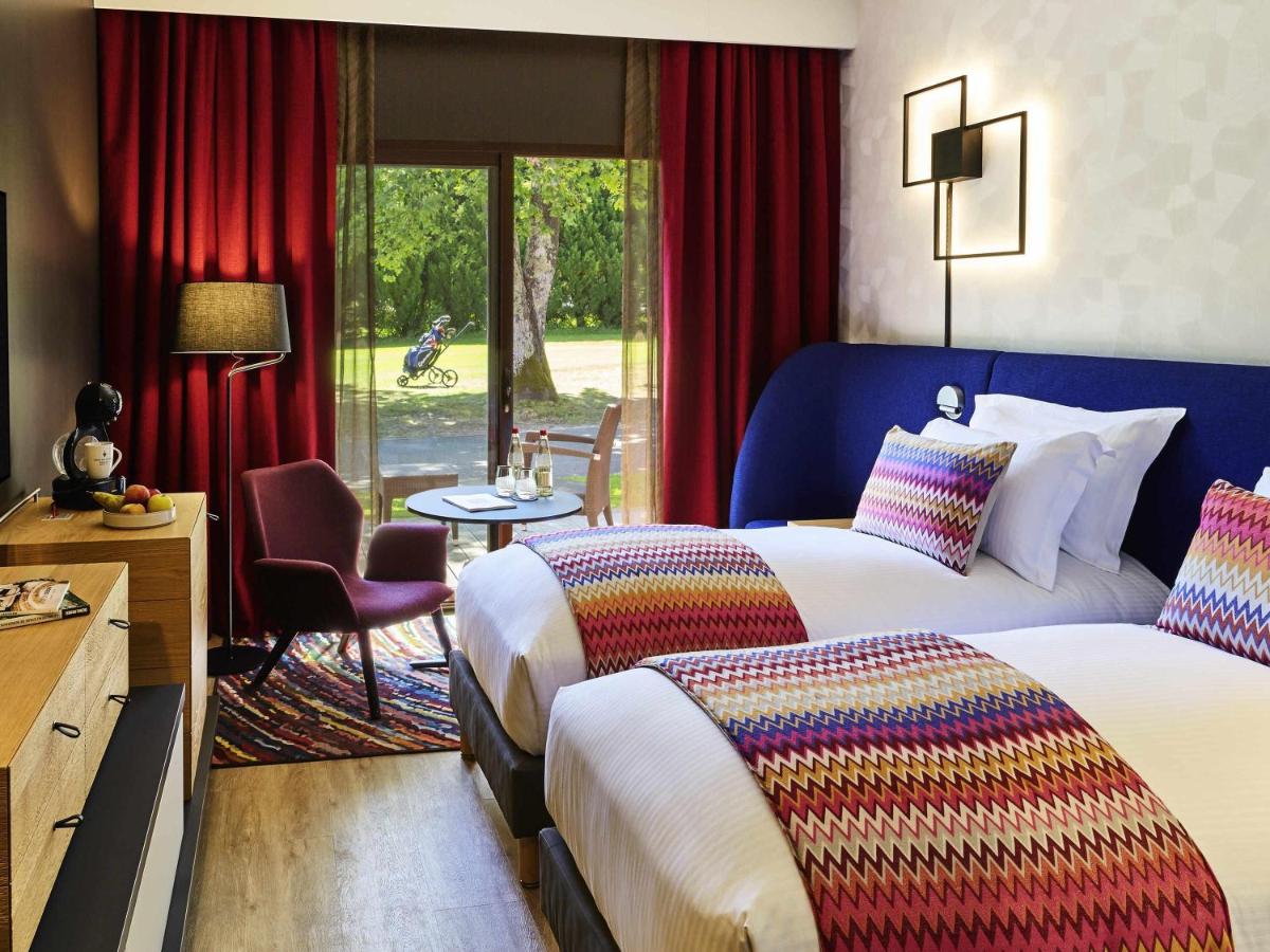 Un ou plusieurs lits dans un hébergement de l'établissement Cabot Hotel Bordeaux - MGallery Collection