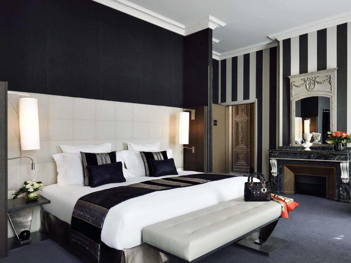 Un ou plusieurs lits dans un hébergement de l'établissement La Cour des Consuls Hotel & Spa Toulouse - MGallery Collection