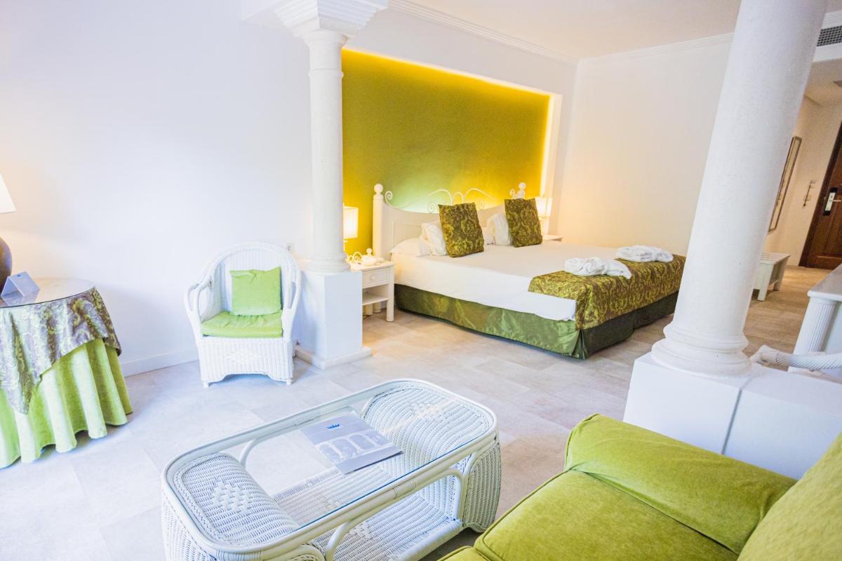 Cama o camas de una habitación en Lago Garden Apart-Suites & Spa Hotel
