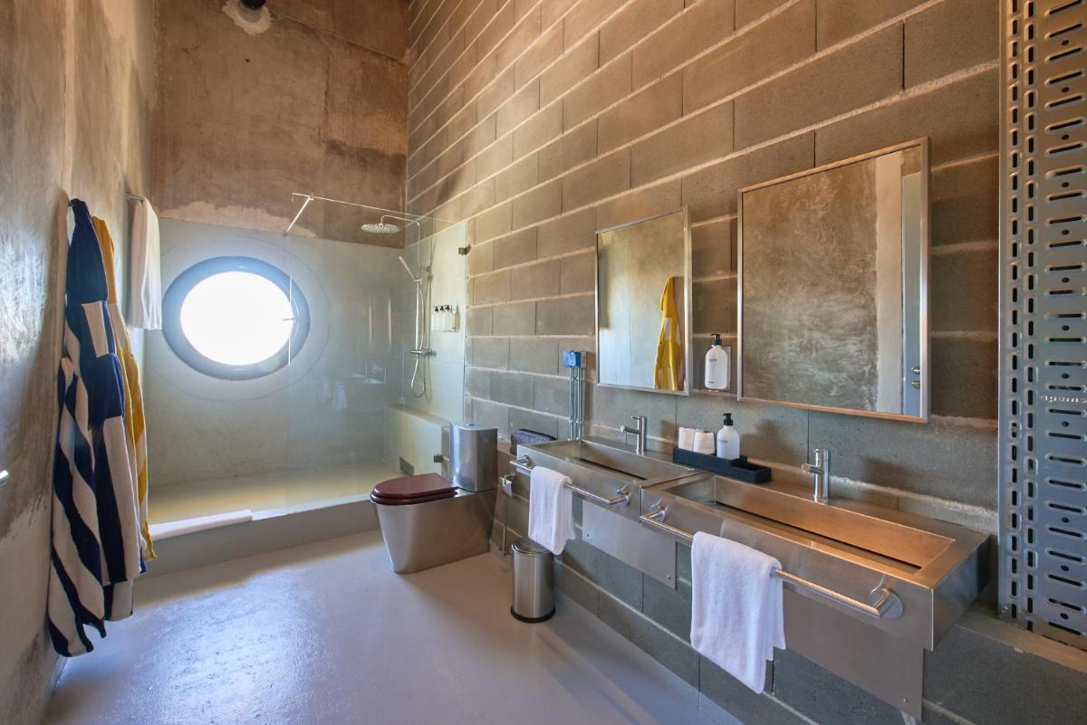 Uma casa de banho em Moagem Industrial Lodge