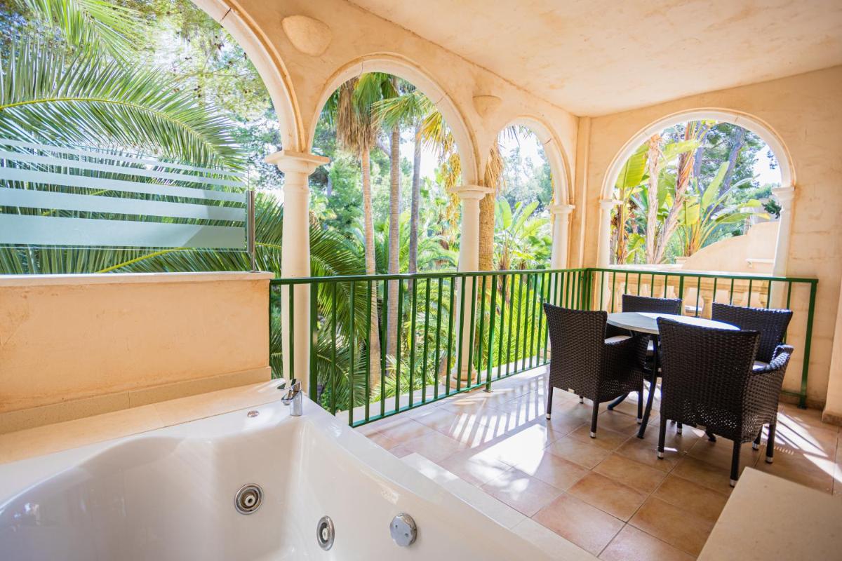 Un balcón o terraza de Lago Garden Apart-Suites & Spa Hotel