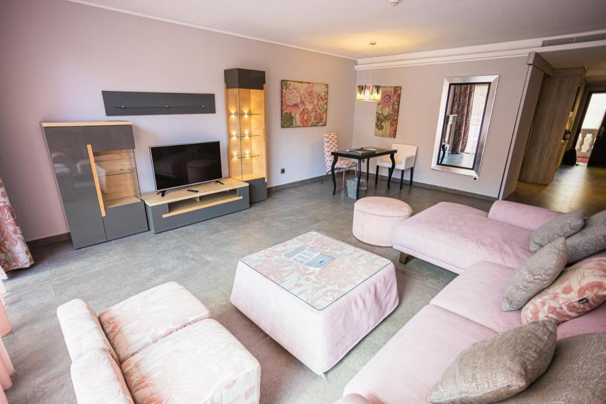 Zona de estar de Lago Garden Apart-Suites & Spa Hotel