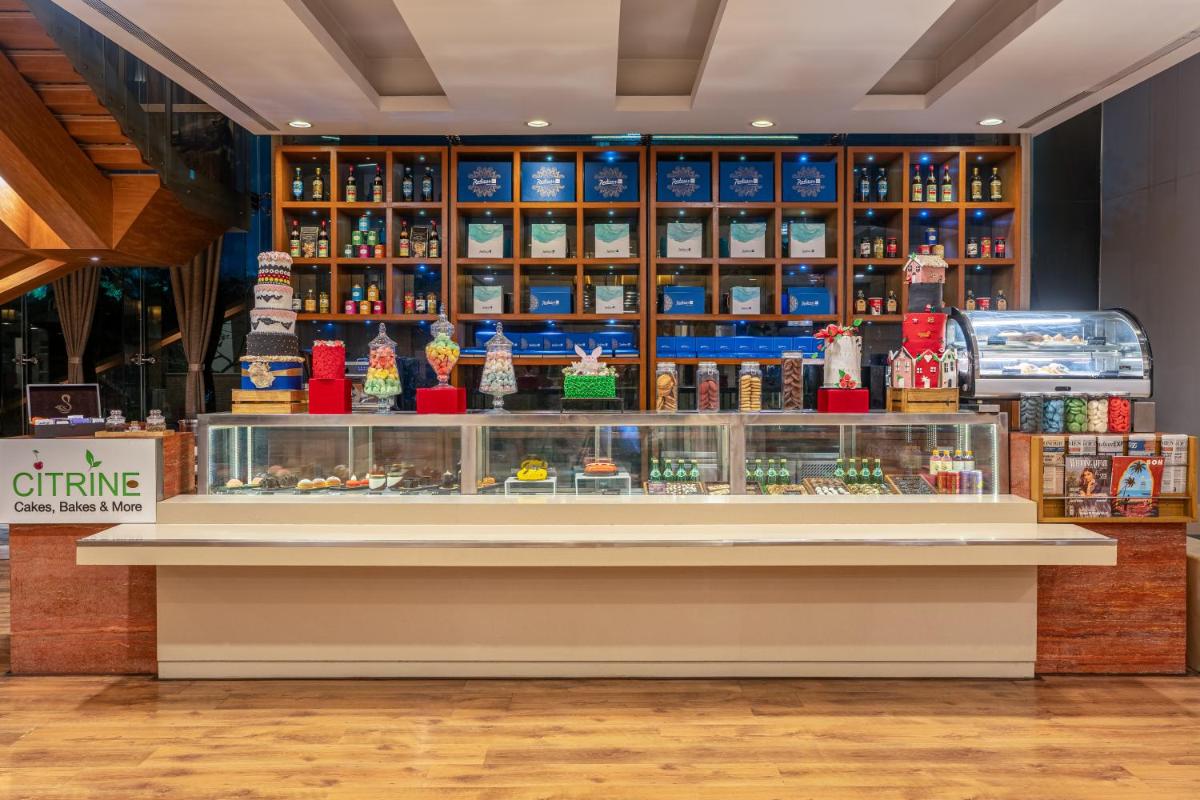 a display case in a store with toys on display at Radisson Blu Hotel Pune Kharadi in Pune