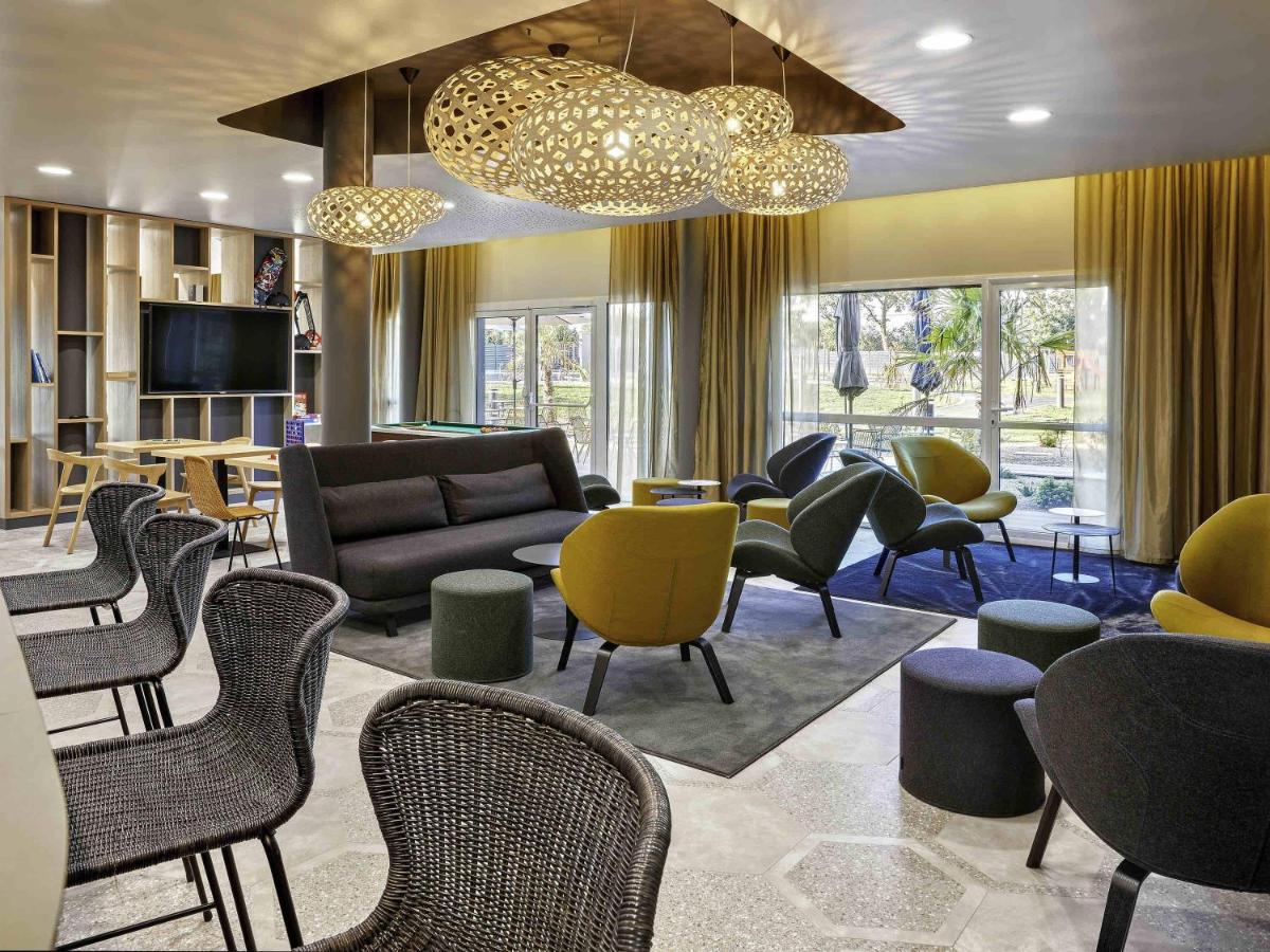 Coin salon dans l'établissement Aparthotel & Spa Adagio Vannes