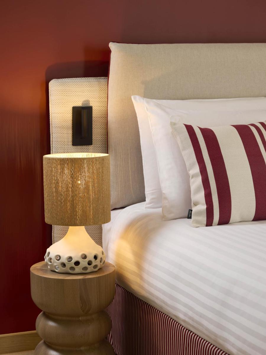 Un ou plusieurs lits dans un hébergement de l'établissement Le Talaia Hôtel & Spa Biarritz - MGallery Collection