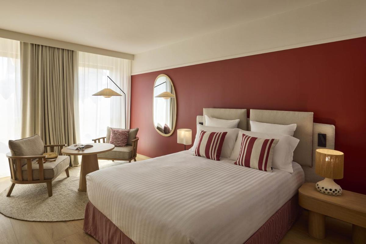 Un ou plusieurs lits dans un hébergement de l'établissement Le Talaia Hôtel & Spa Biarritz - MGallery Collection