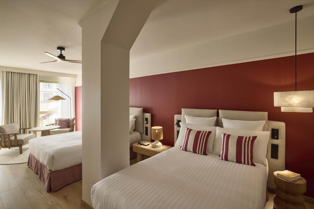 Un ou plusieurs lits dans un hébergement de l'établissement Le Talaia Hôtel & Spa Biarritz - MGallery Collection