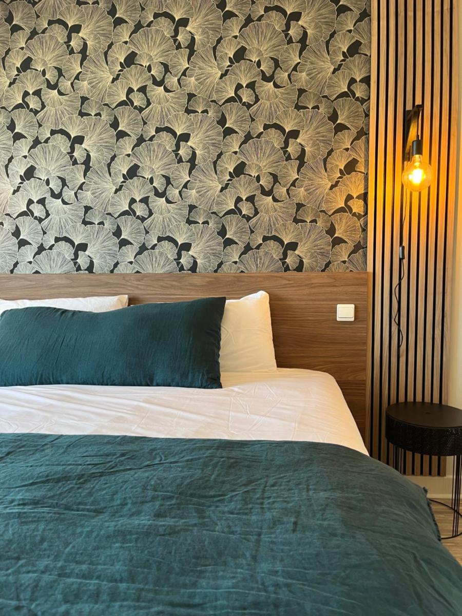 Un ou plusieurs lits dans un hébergement de l'établissement Hôtel Mar I Cel & Spa