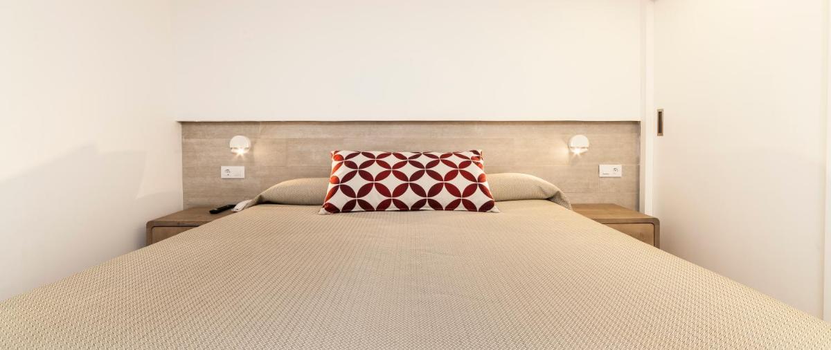 Cama o camas de una habitación en Hoposa Hotel & Apartaments VillaConcha