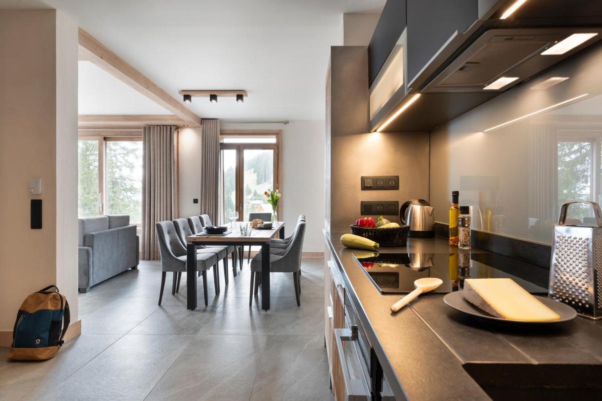 Cuisine ou kitchenette dans l'établissement MGM Hôtels & Résidences - Résidence Le Hameau de l'Ours