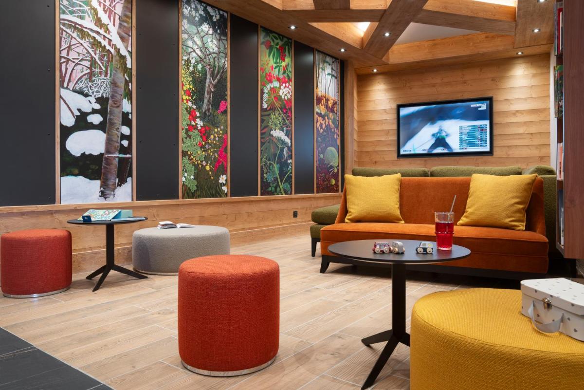 Coin salon dans l'établissement MGM Hôtels & Résidences - Résidence Le Hameau de l'Ours