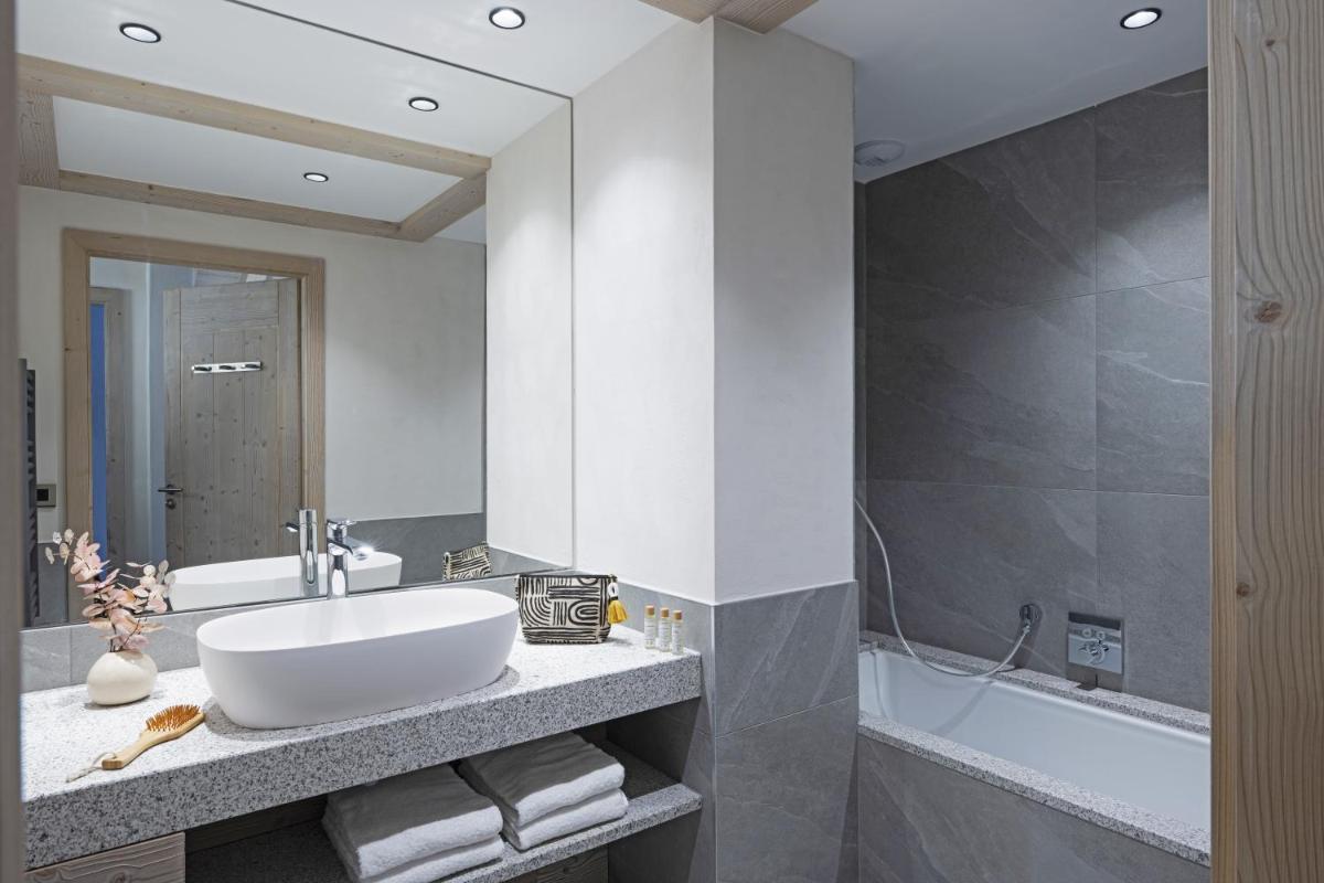 Salle de bains dans l'établissement MGM Hôtels & Résidences - Résidence Chalets de Joy
