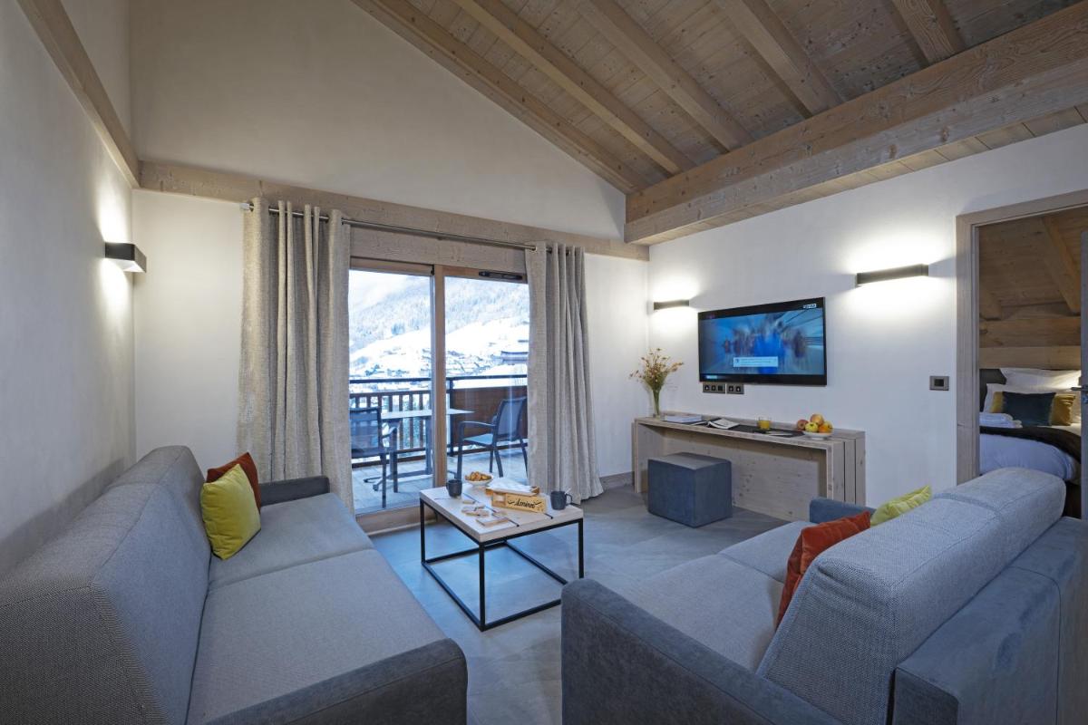 Coin salon dans l'établissement MGM Hôtels & Résidences - Résidence Chalets de Joy