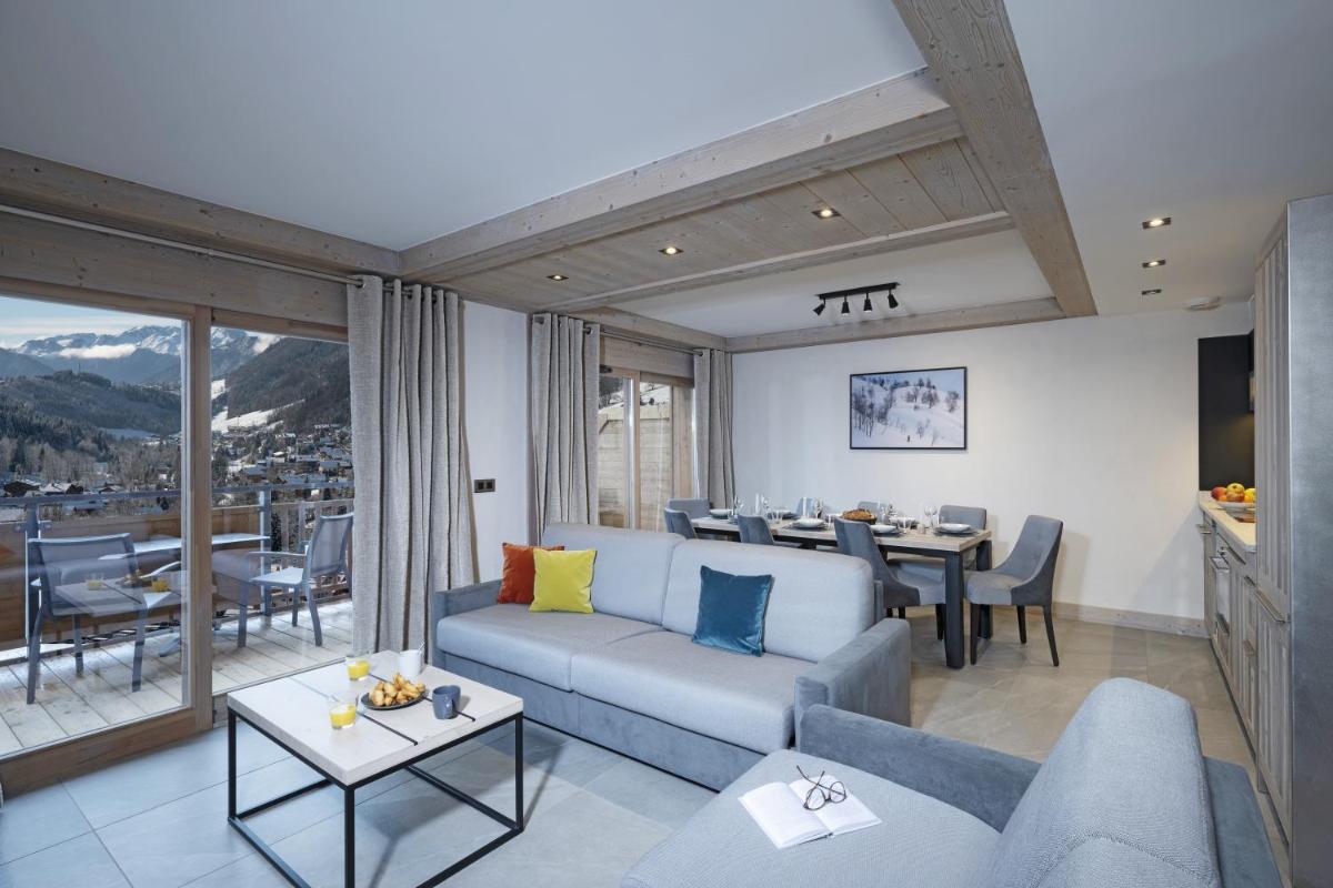 Coin salon dans l'établissement MGM Hôtels & Résidences - Résidence Chalets de Joy