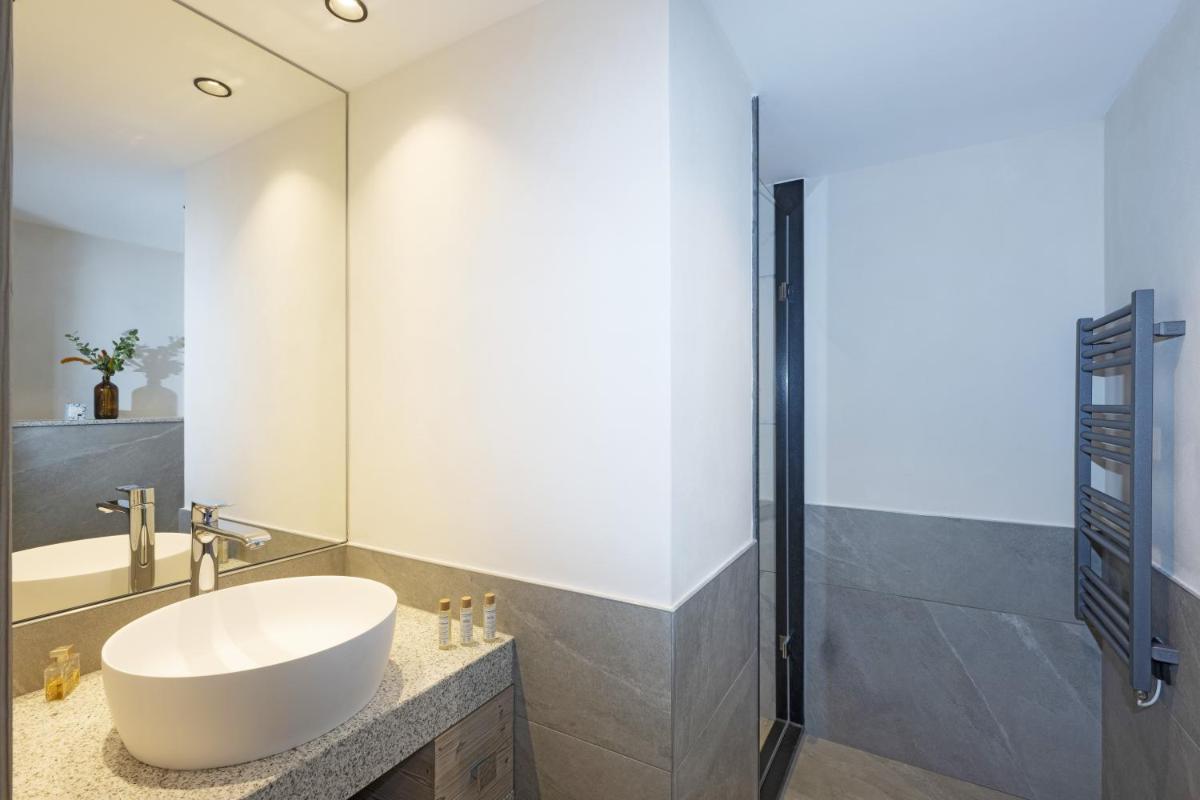 Salle de bains dans l'établissement MGM Hôtels & Résidences - Résidence Chalets de Joy