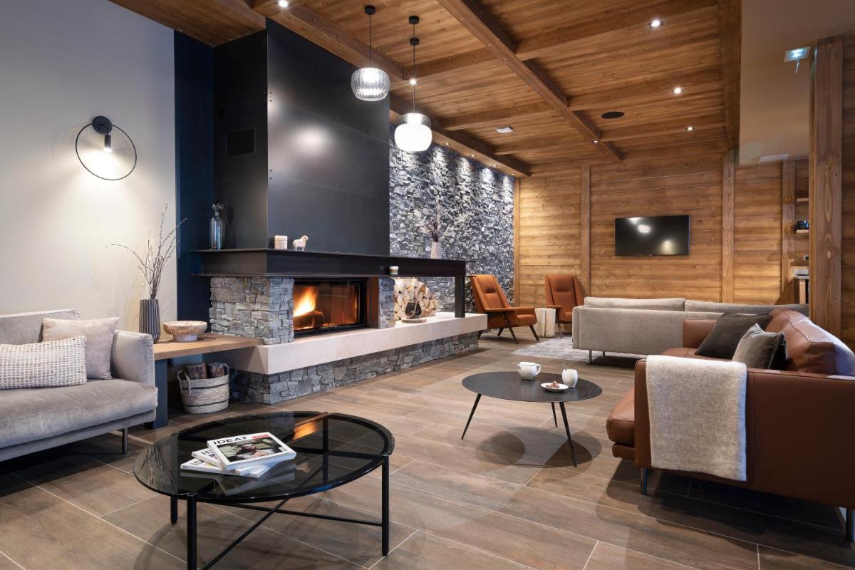 Coin salon dans l'établissement MGM Hôtels & Résidences - Résidence Chalets de Joy