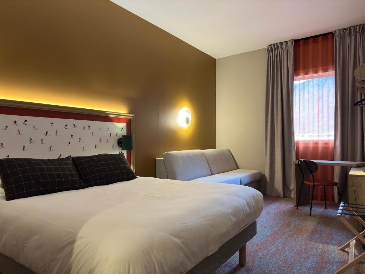 Un ou plusieurs lits dans un hébergement de l'établissement Best Western Coeur de Maurienne Hotel Restaurant & Spa