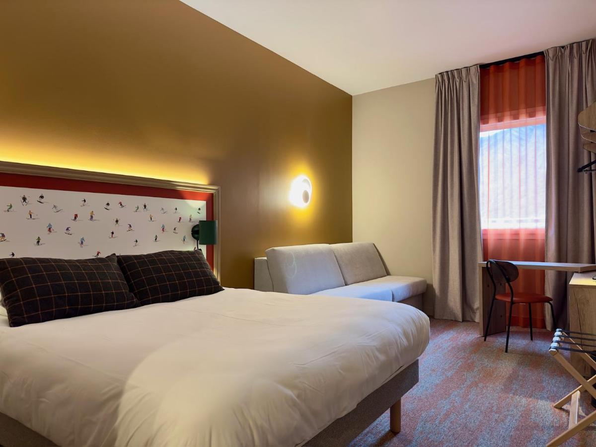 Un ou plusieurs lits dans un hébergement de l'établissement Best Western Coeur de Maurienne Hotel Restaurant & Spa