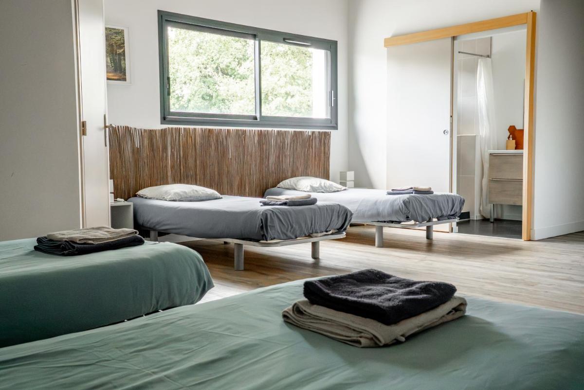 Chambres d'étape - Le Répit de l'Oust - Certifié Ecolabel Européen - Housity