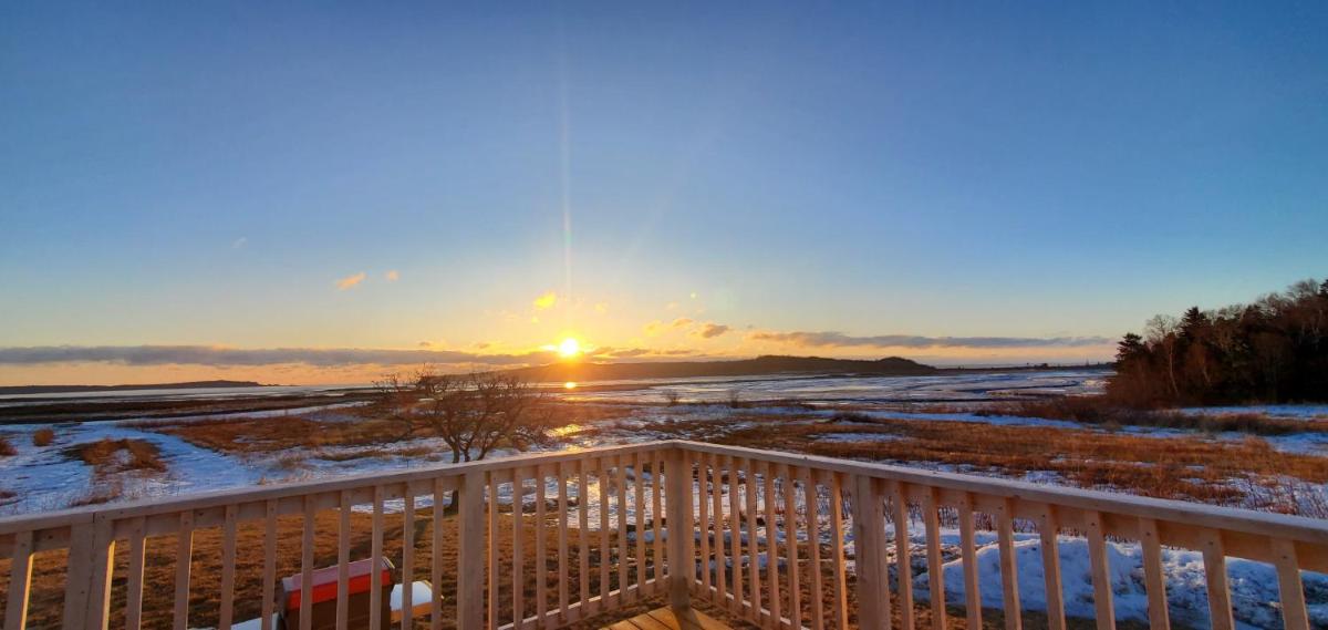 Sunrise by the Sea - Housity