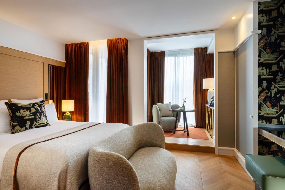 Un ou plusieurs lits dans un hébergement de l'établissement Hôtel De Sers Champs Elysées Paris
