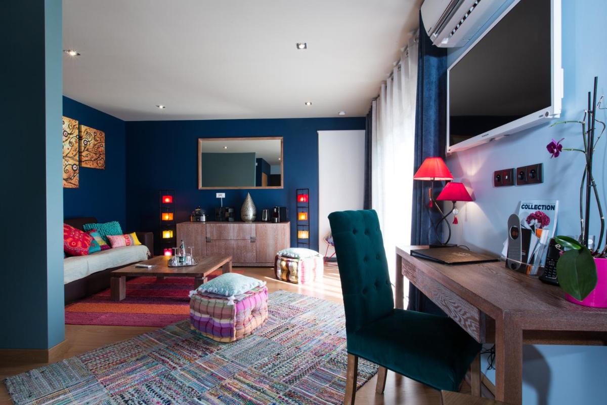 Coin salon dans l'établissement Domaine de Chalvêches Hôtel SPA 4*