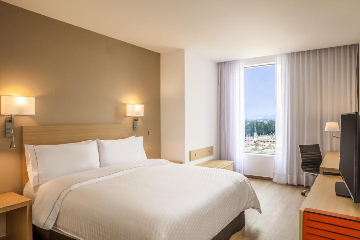 Fiesta Inn Parque Puebla - Housity