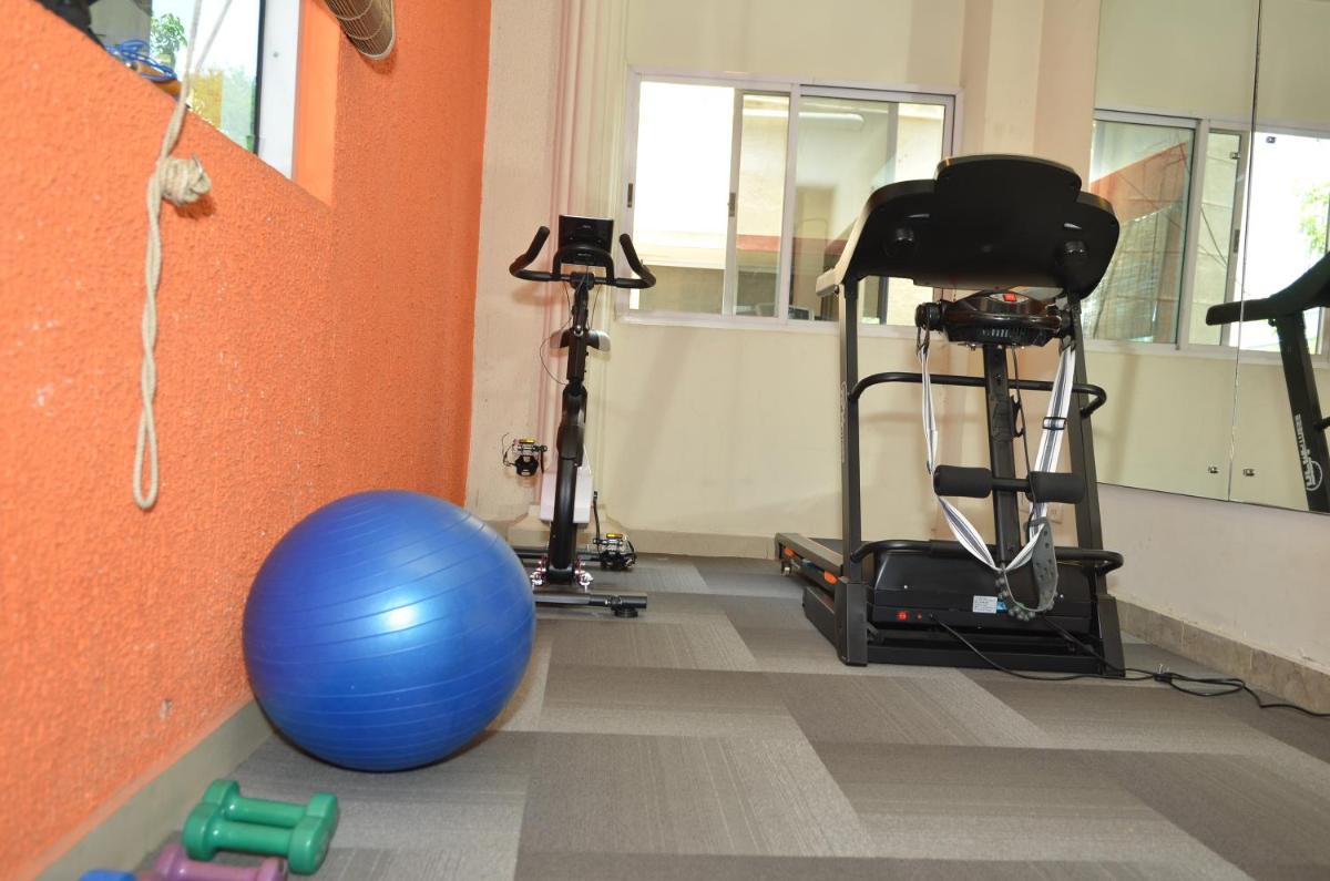 Cubbon Suites - 10 Minute walk to MG Road, MG Road Metro and Church Street - Housity