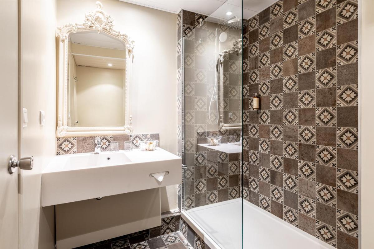 Salle de bains dans l'établissement Hotel Mercure Parc du Coudray - Barbizon