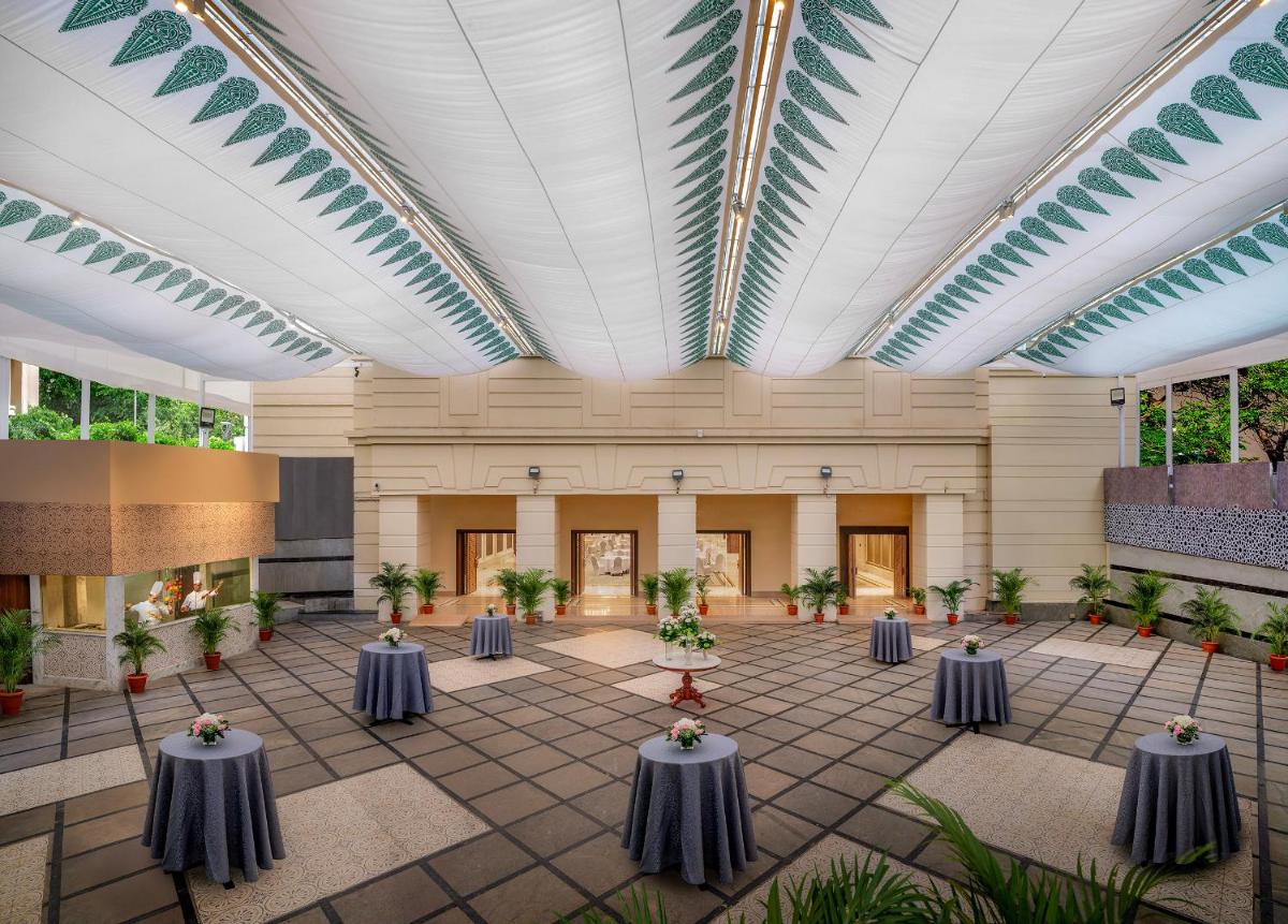 an image of a banquet hall with tables at ITC Kakatiya, a Luxury Collection Hotel, Hyderabad in Hyderabad