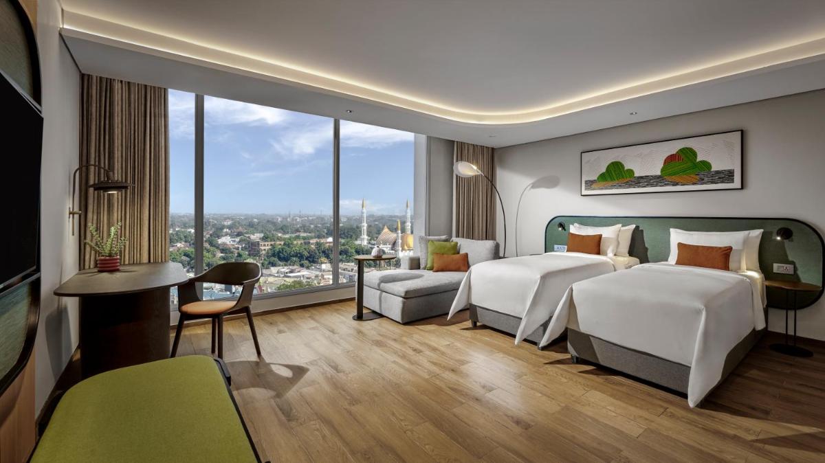 ARTOTEL Living World Kota Wisata - Housity