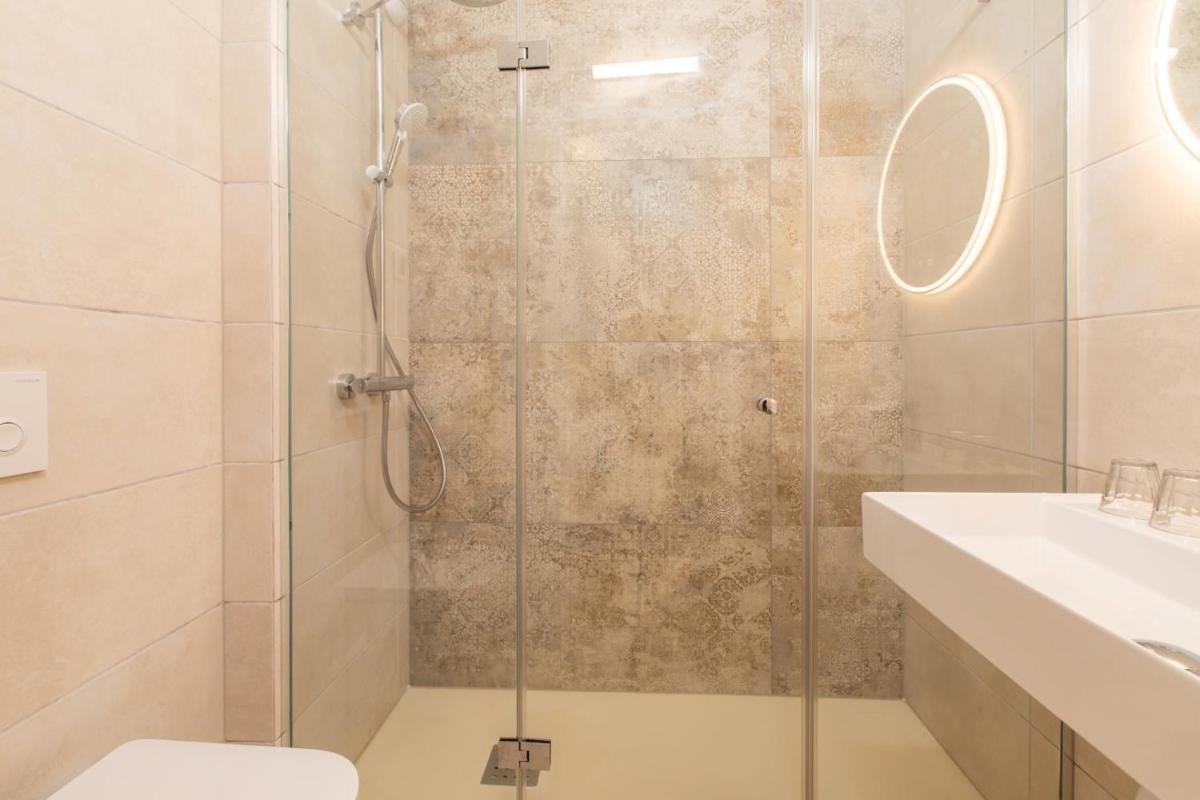 Salle de bains dans l'établissement Hôtel Terra Vinum