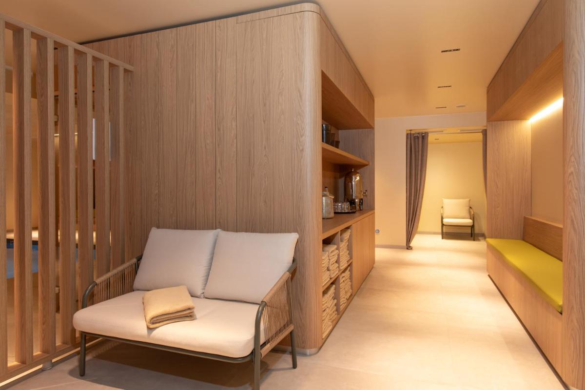 Coin salon dans l'établissement Hôtel Terra Vinum