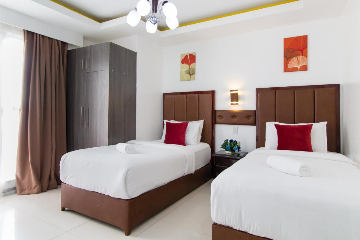JMM Apartment Suites - Housity