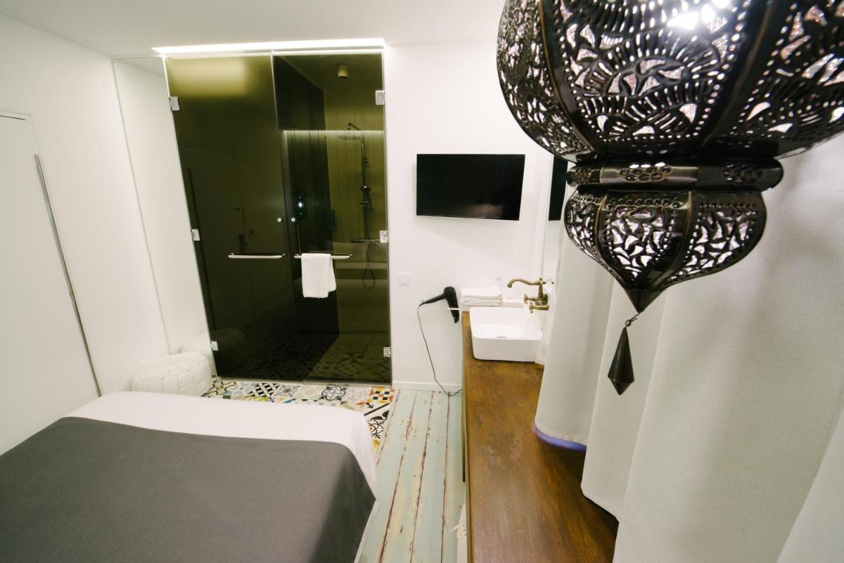 Un ou plusieurs lits dans un hébergement de l'établissement Atypik Hotel