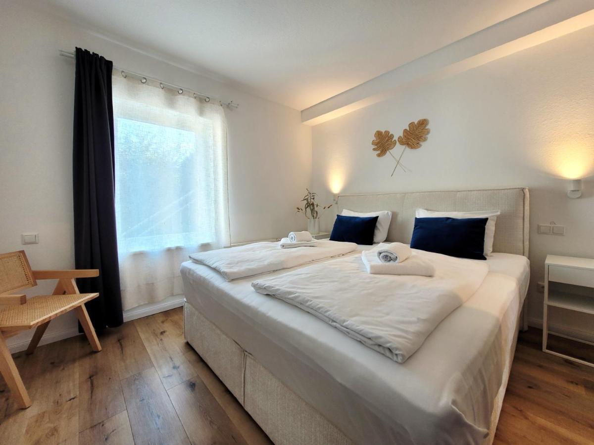 Ferienwohnung mit Meerblick und Terrasse - Nur 50 Meter zum Strand - inklusive eigenem Parkplatz und Fahrradunterstellplatz - Housity