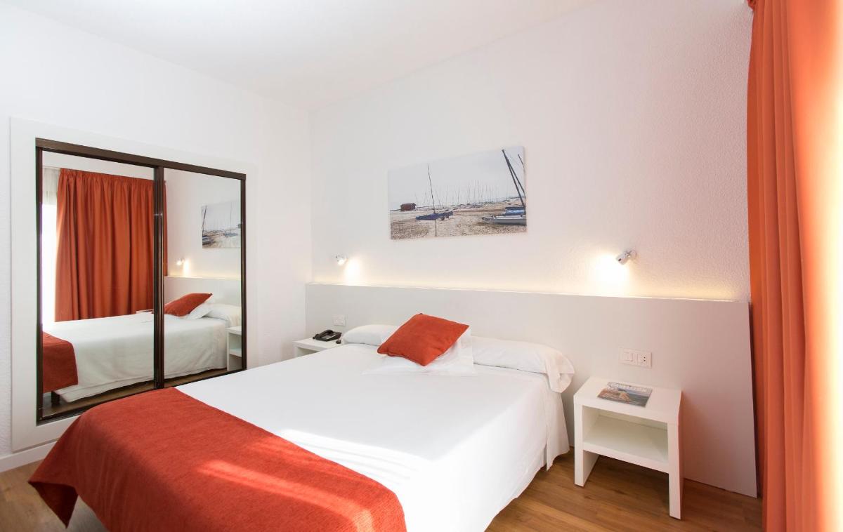 Cama o camas de una habitación en Intelier Orange