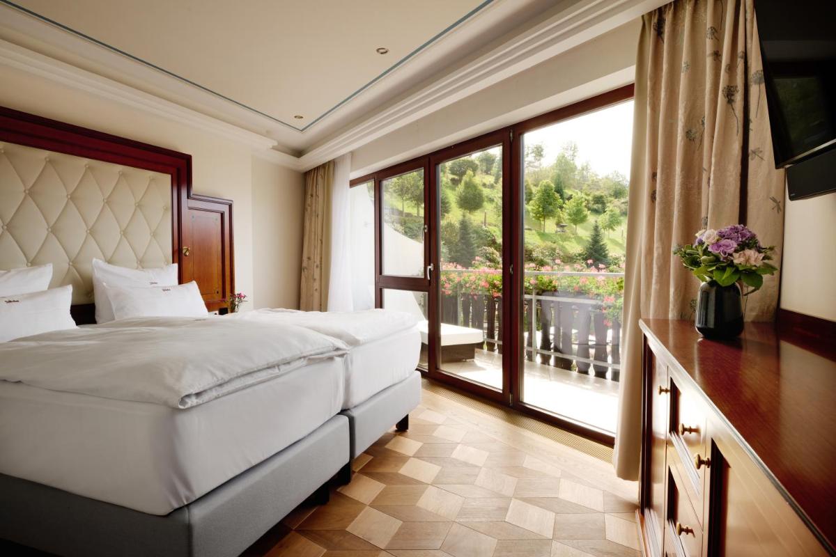 Ein Bett oder Betten in einem Zimmer der Unterkunft Hotel Dollenberg