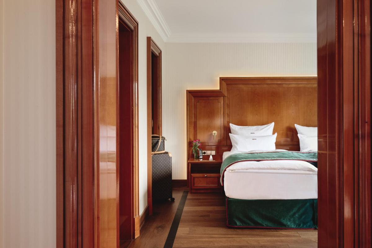 Ein Bett oder Betten in einem Zimmer der Unterkunft Hotel Dollenberg