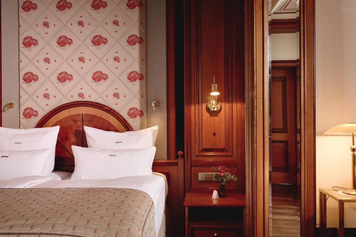 Ein Bett oder Betten in einem Zimmer der Unterkunft Hotel Dollenberg