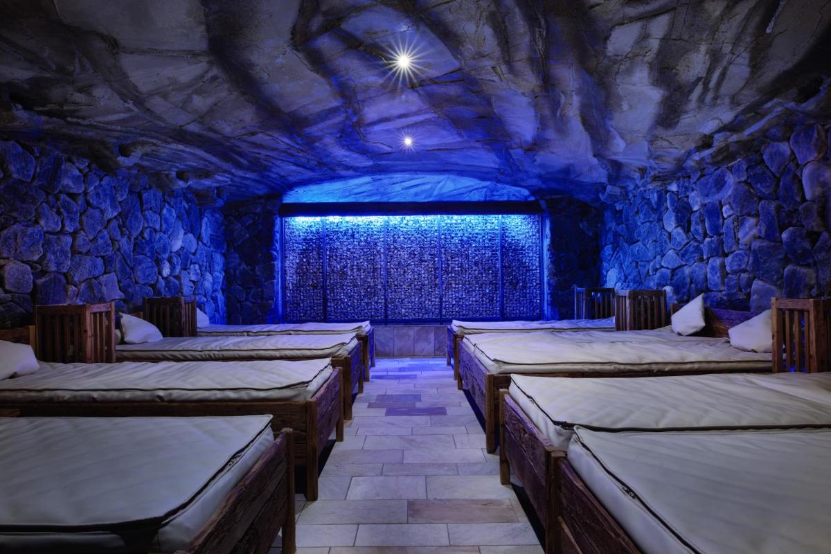 Ein Bett oder Betten in einem Zimmer der Unterkunft Hotel Dollenberg