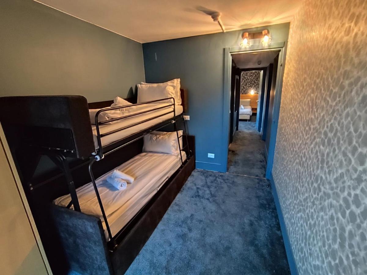 Un ou plusieurs lits dans un hébergement de l'établissement Hotel Turan & Spa