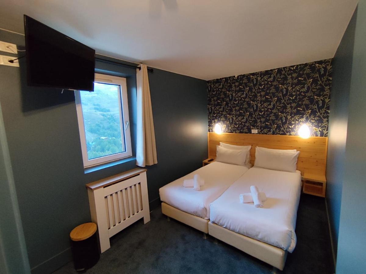 Un ou plusieurs lits dans un hébergement de l'établissement Hotel Turan & Spa