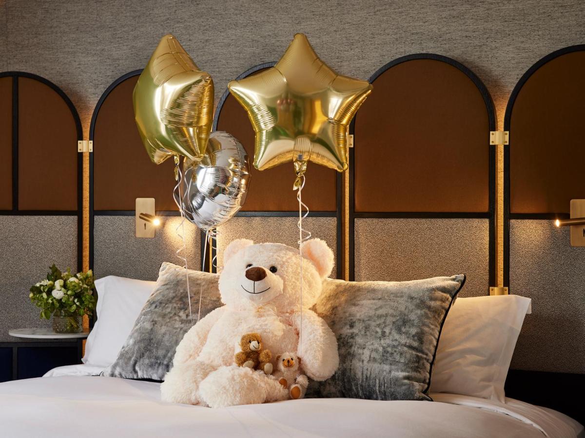 Un ou plusieurs lits dans un hébergement de l'établissement Sofitel Paris Baltimore Tour Eiffel